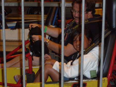 Kasen and Daddy riding go karts